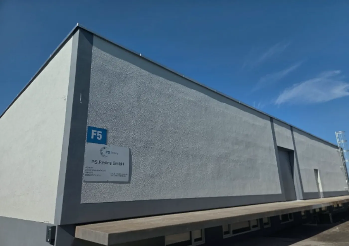 The PS Resins GmbH plant in Pirmasens, with the company sign on the façade